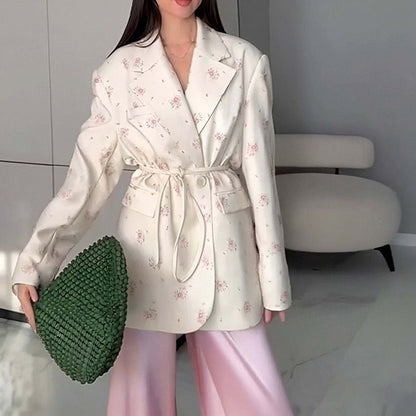 Oversized belted blazer with puff sleeves – Modern and sophisticated elegance